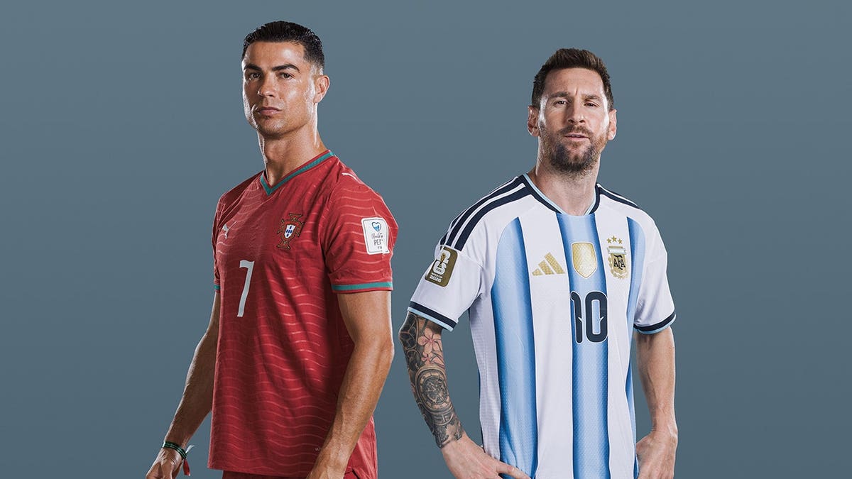 Cristiano Ronaldo and Lionel Messi posing for official FIFA World Cup portraits