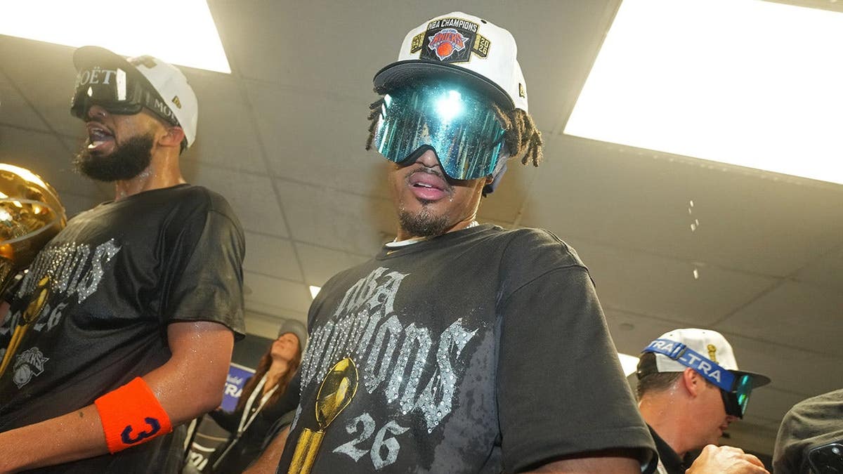 Dillon Jones celebrating after winning NBA Finals at Frost Bank Center in San Antonio, Texas