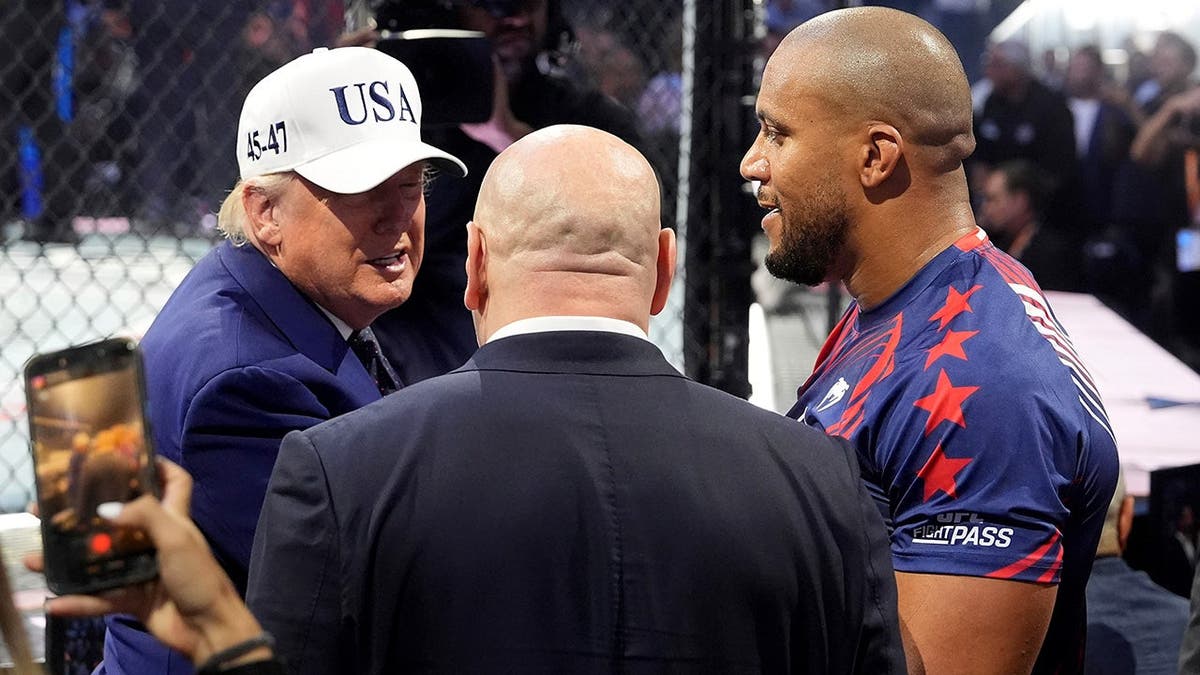President Donald Trump congratulating Ciryl Gane on the South Lawn of the White House