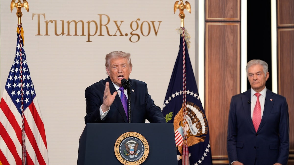 President Donald Trump speaking at the Old Eisenhower Executive Office Building with Dr. Mehmet Oz listening