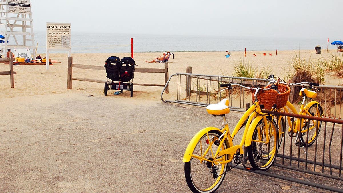 Bicycles locked at a rack along Main Beach in East Hampton on a foggy day