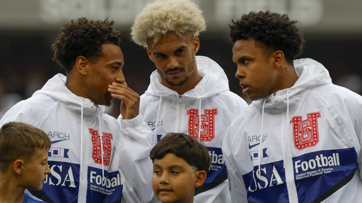 Tyler Adams, Antonee Robinson and Weston McKennie talk before the USA-Germany friendly before the World Cup. (Photo by Michael Miller/ISI Photos/ISI Photos via Getty Images)