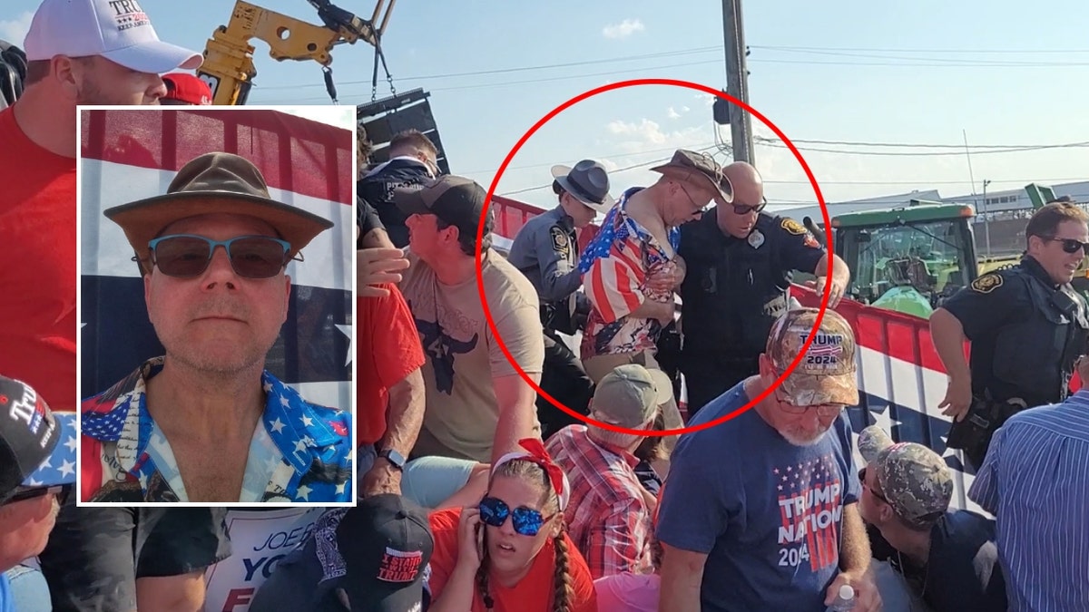 David Dutch walking with visible gunshot wounds after Trump rally