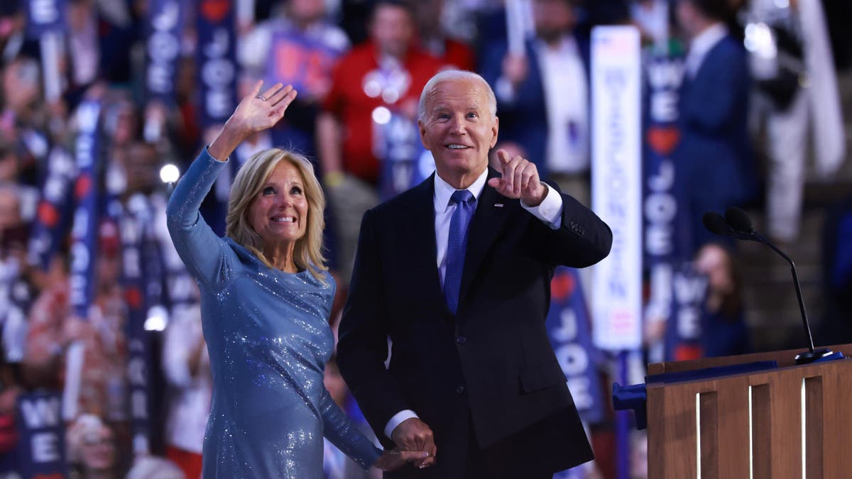 First Lady Jill Biden and President Joe Biden waving to audience at Democratic National Convention in Chicago