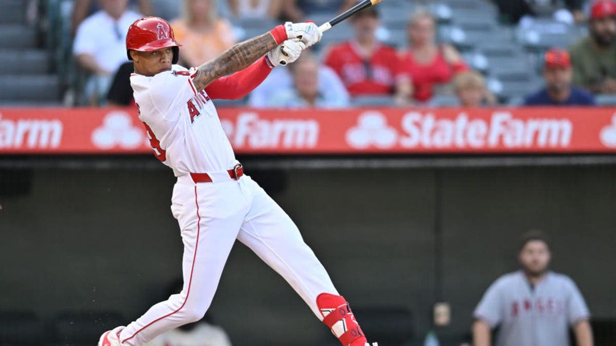 Jordyn Adams hitting a baseball during a game at Angel Stadium of Anaheim