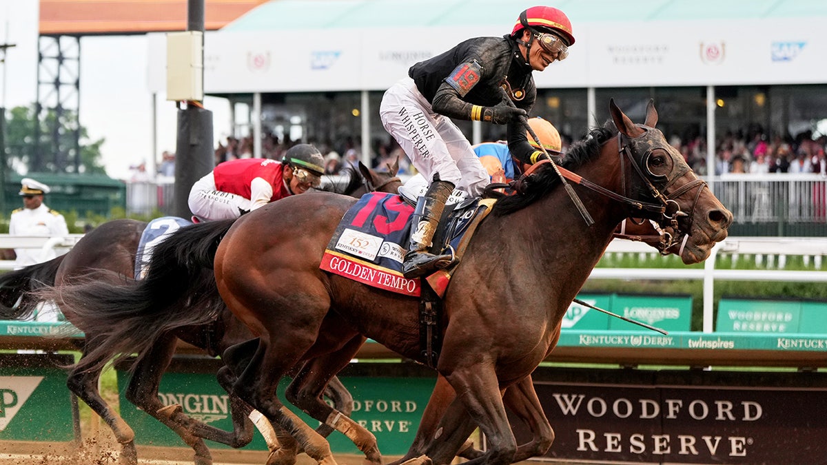 Golden Tempo ridden by Jose L. Ortiz crossing finish line at Kentucky Derby horse race