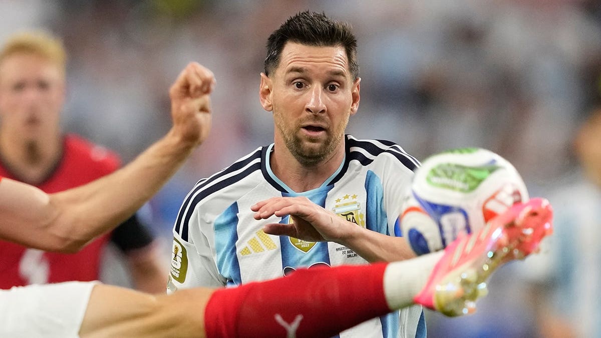 Argentina's Lionel Messi watching the ball during a soccer match in Arlington, Texas.