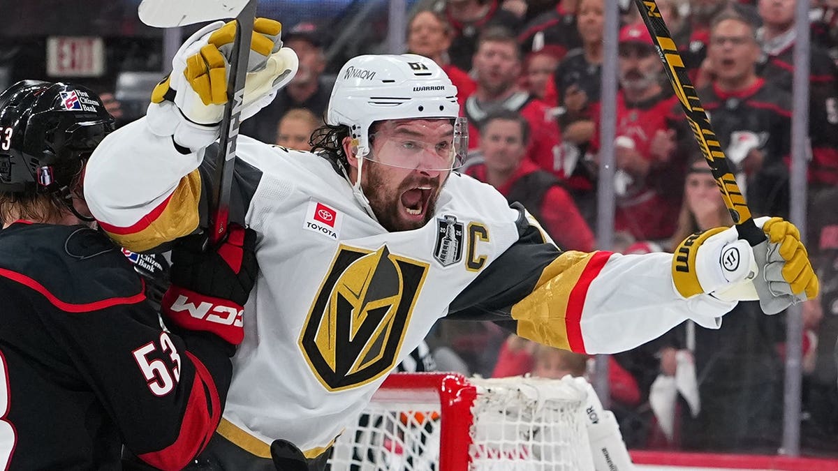 Mark Stone of the Vegas Golden Knights reacts after scoring a goal during a hockey game.
