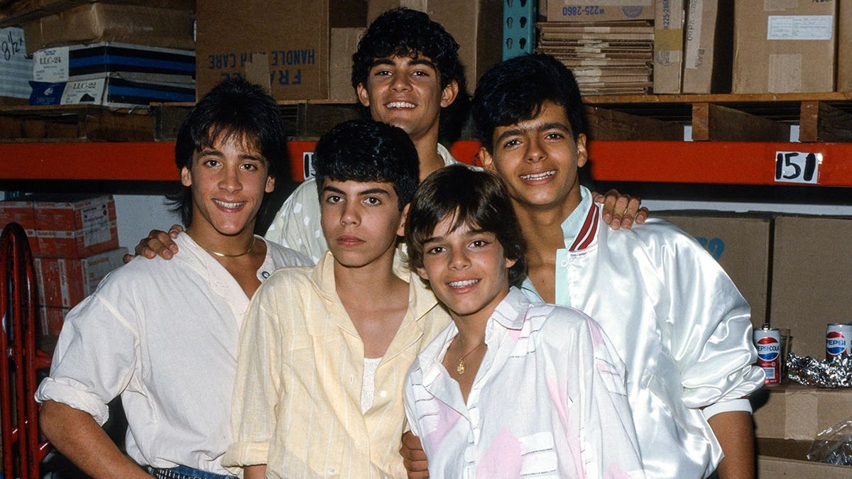 Menudo posing for a photo circa 1984