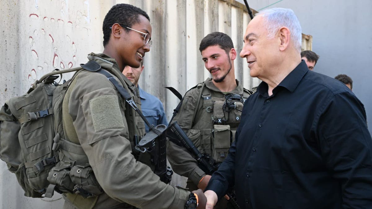 Prime Minister Benjamin Netanyahu meeting soldiers on Israel-Lebanon border