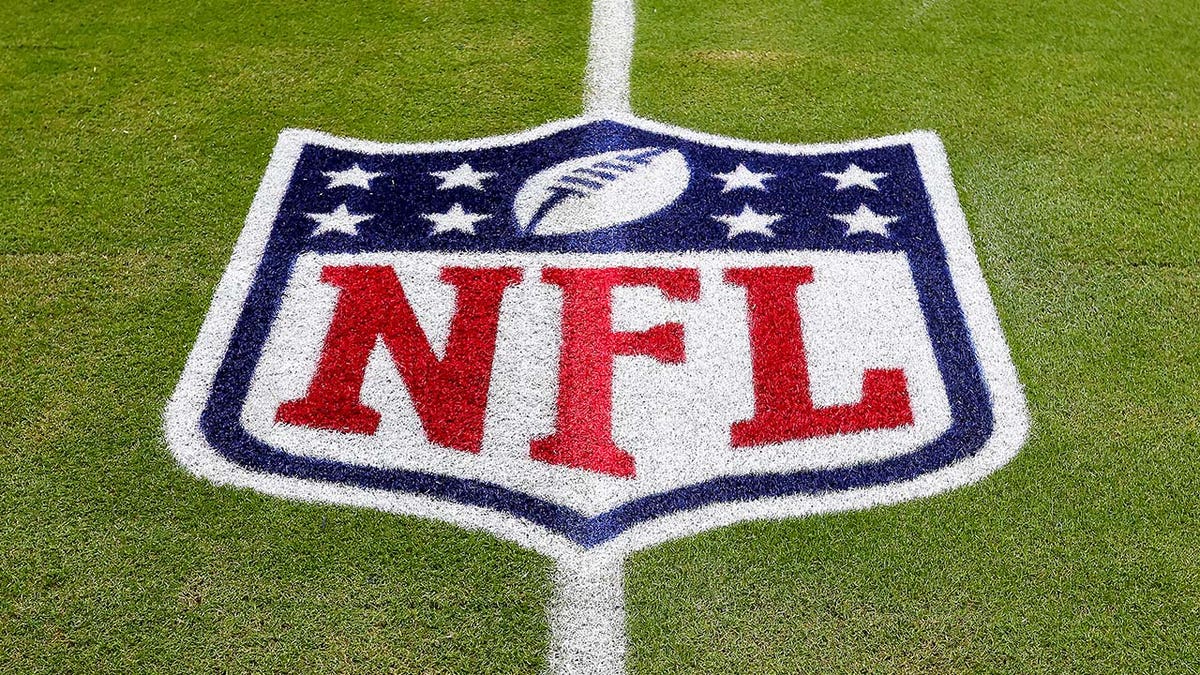 The NFL logo displayed on the field at Hard Rock Stadium.