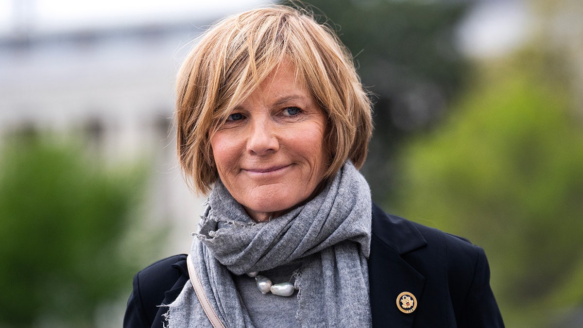 Rep. Susie Lee walking outside the U.S. Capitol building