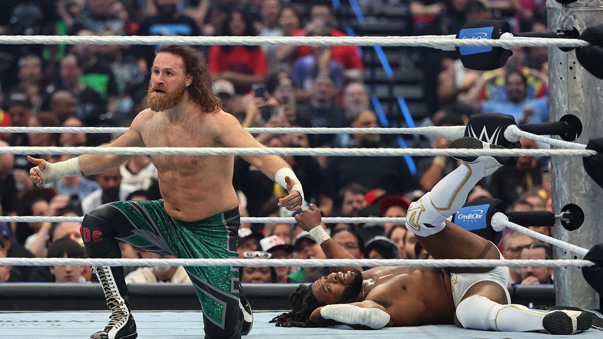Sami Zayn and Trick Williams reacting during a wrestling match at Allegiant Stadium in Las Vegas