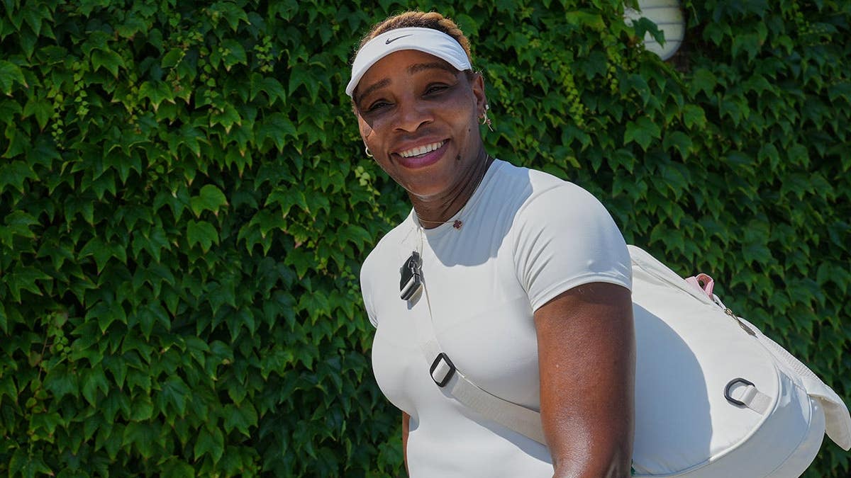 Serena Williams smiling after a training session at the All England Lawn Tennis and Croquet Club