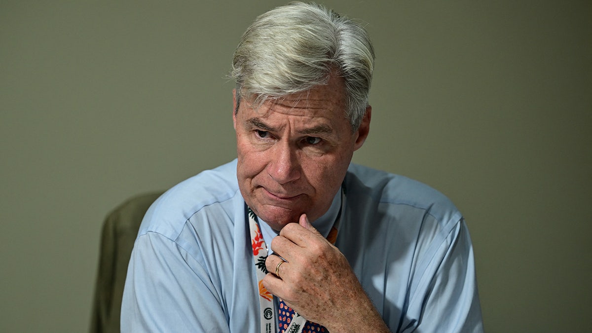 Sen. Sheldon Whitehouse speaking with journalists at COP30 Blue Zone in Belem Brazil