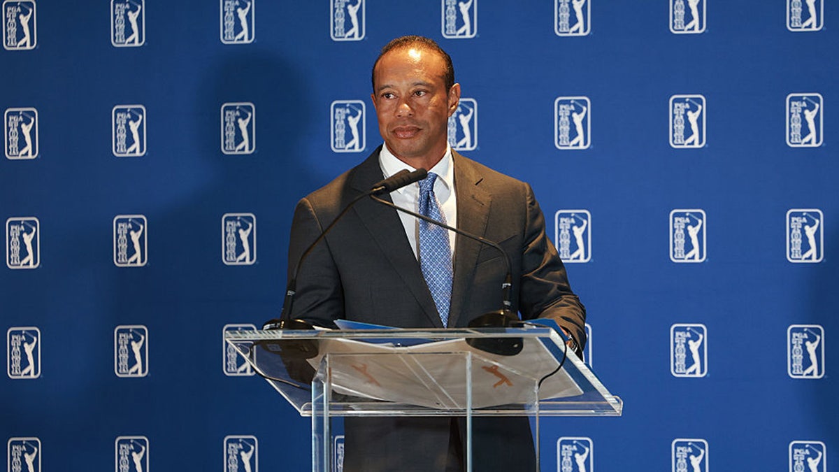 Tiger Woods speaking at a PGA Tour press conference in Cromwell, Connecticut
