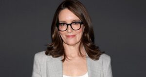 Tina Fey Made the ‘It’ Girl Red Sweater Trend Work for Summer, and Now We Want One Too Tina Fey Made the ‘It’ Girl Red Sweater Trend Work for Summer, and Now We Want One Too