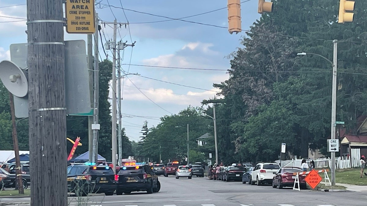 Police officers work at the scene of a shooting near a festival in Toledo, Ohio on Saturday, June 6, 2026.
