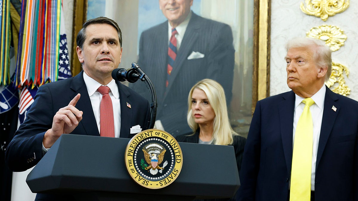 U.S. Deputy Attorney General Todd Blanche speaking in the Oval Office with Attorney General Pam Bondi and President Donald Trump