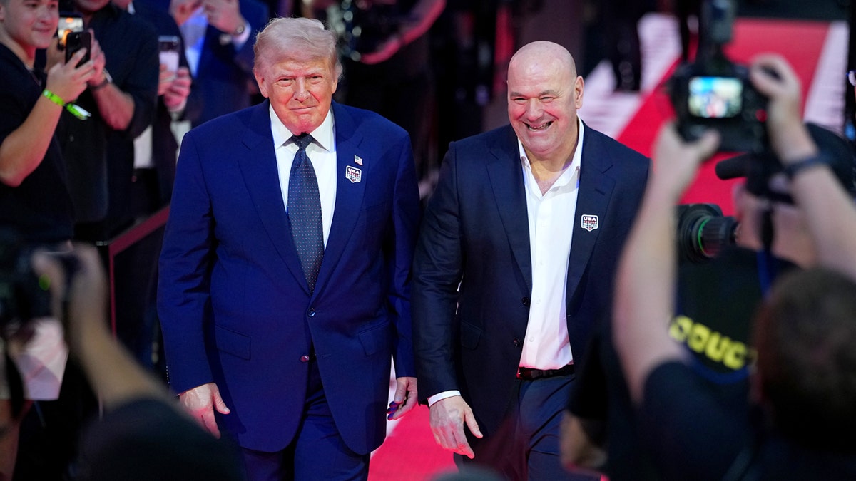 UFC President Dana White and President Donald Trump walking to the Octagon on the South Lawn at the White House
