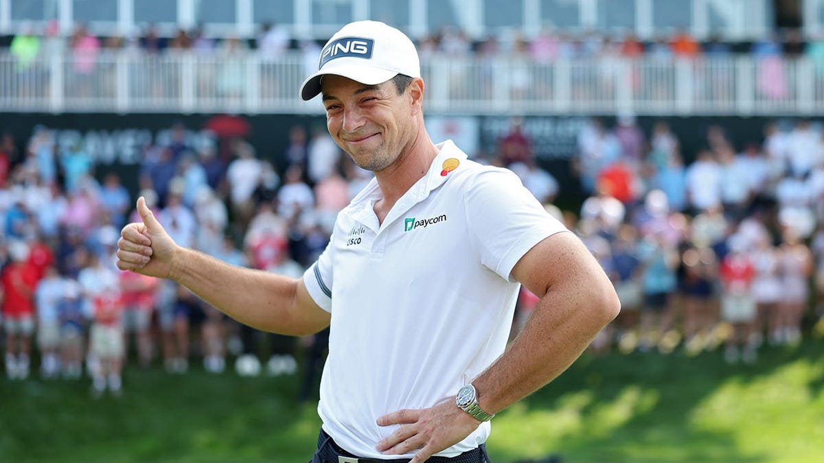 Viktor Hovland reacting after winning the Travelers Championship playoff at TPC River Highlands.
