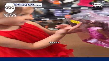 Excited girl finds Barbie doll that has hearing aid like her