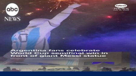 Argentina fans celebrate win over England in front of big Messi statue Argentina fans celebrate win over England in front of big Messi statue