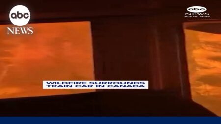 Wildfire surrounds train car in Canada Wildfire surrounds train car in Canada