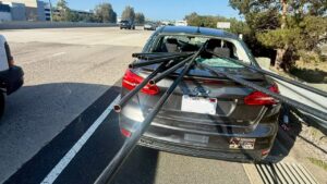 Unsecured metal pipes impale California sedan in terrifying highway crash Unsecured metal pipes impale California sedan in terrifying highway crash