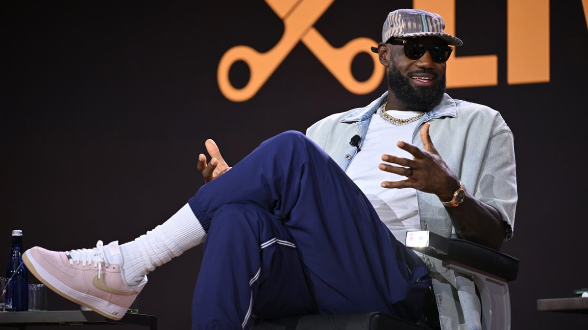 LeBron James speaks onstage during The Shop Live panel at Fanatics Fest NYC.