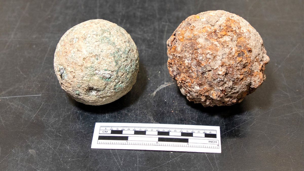 Two Alamo cannonballs next to each other