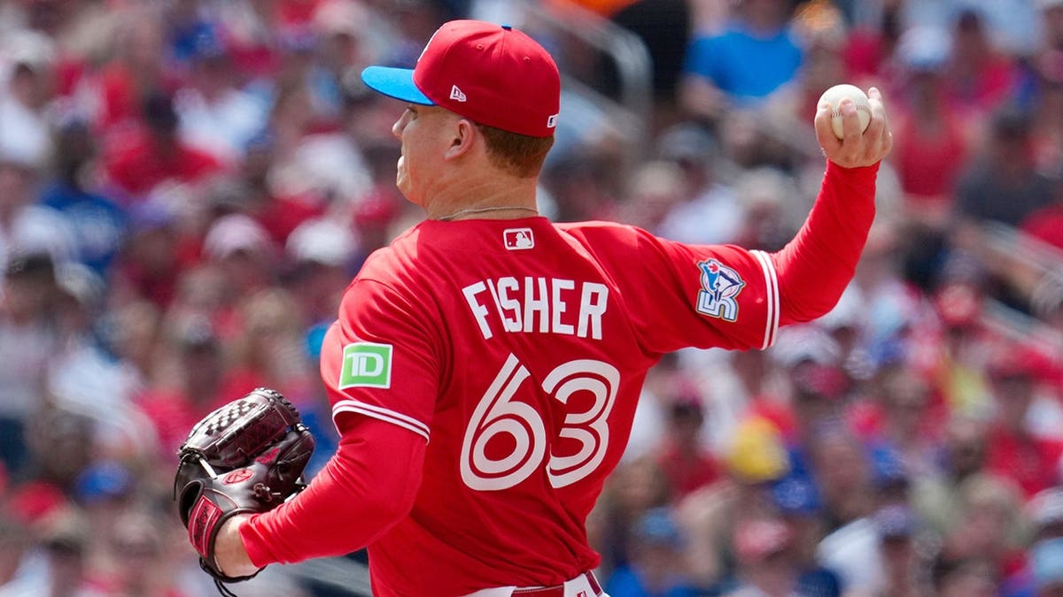 Braydon Fisher throws on the mound in Toronto.