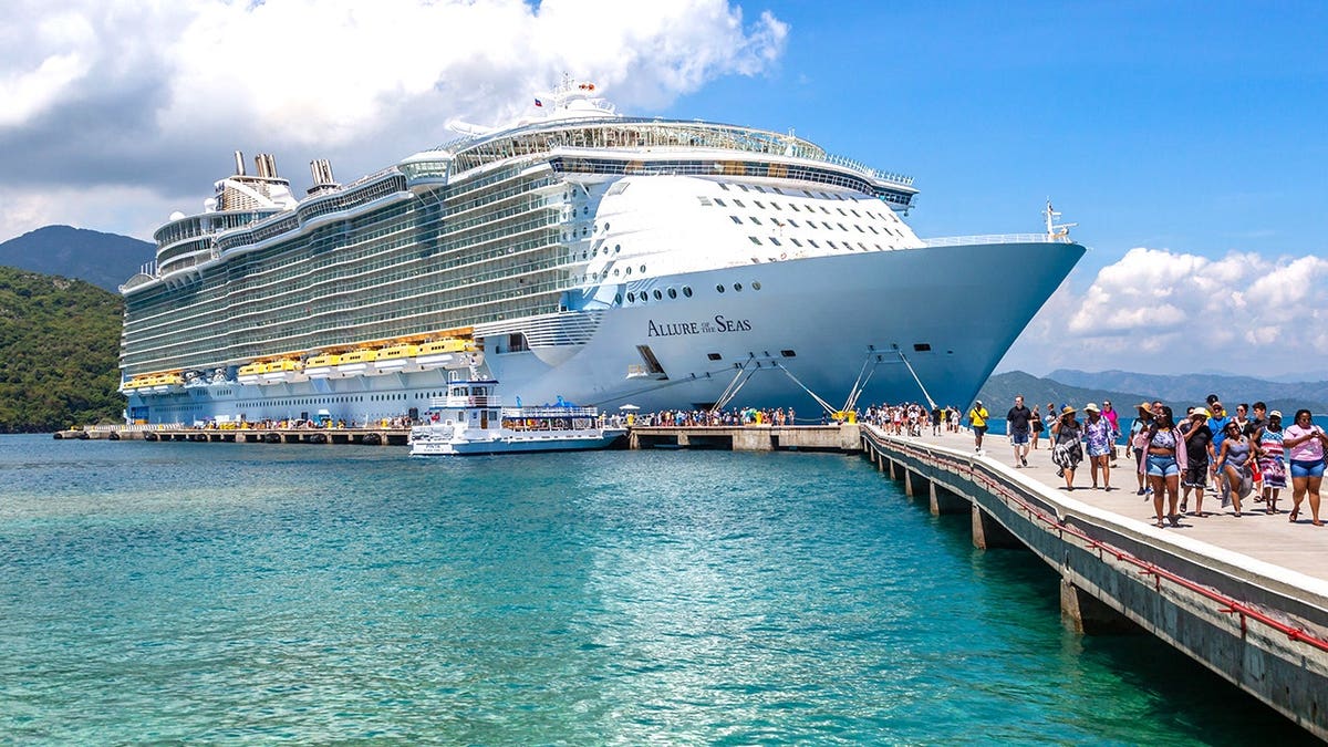 View of cruise passengers leaving ship in Labadee