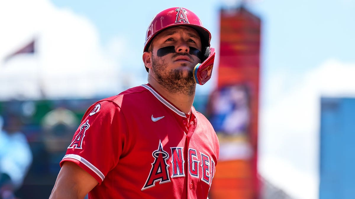 Mike Trout looks on at Target Field