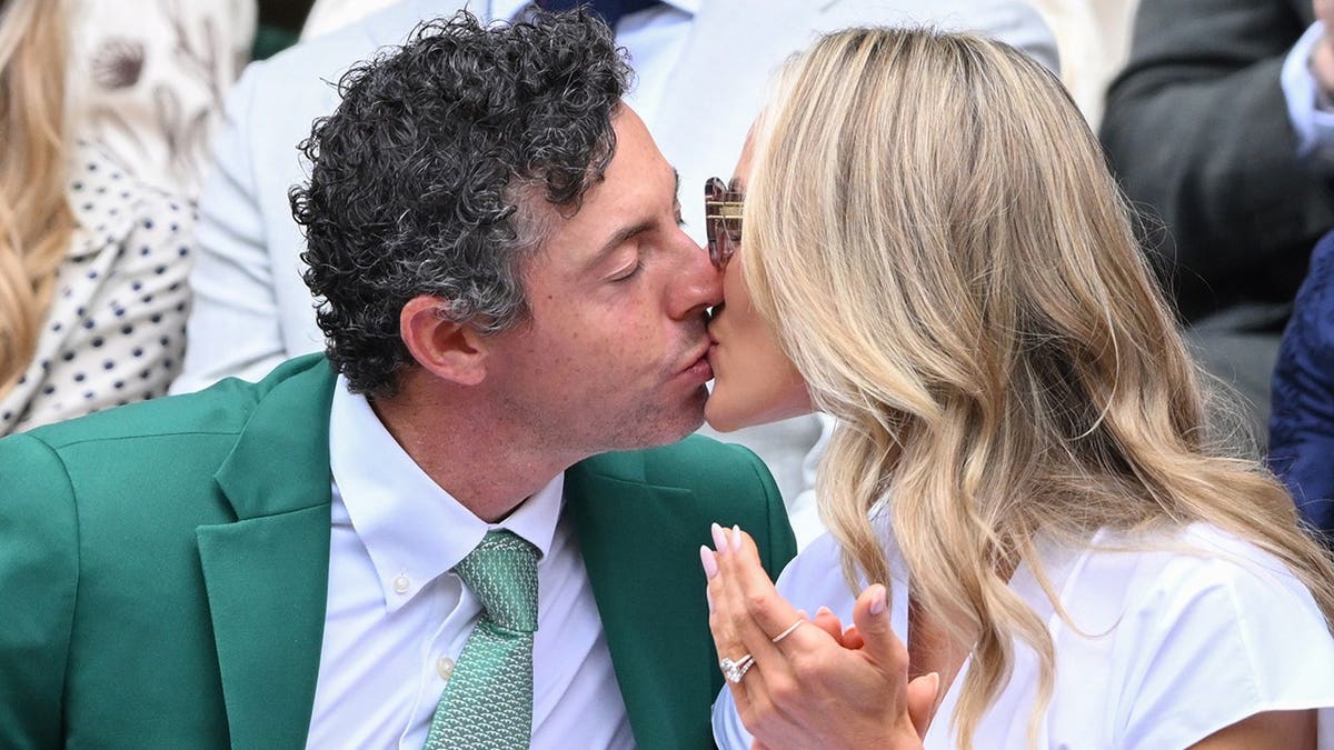Rory McIlroy kisses wife, Erica Stoll