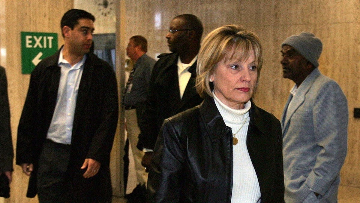 Sharon Rocha and Brent Rocha enter the San Mateo Court House in Redwood City.