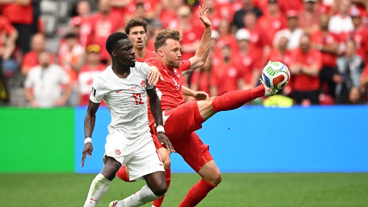 SOCCER-WORLDCUP-SWI-CAN/