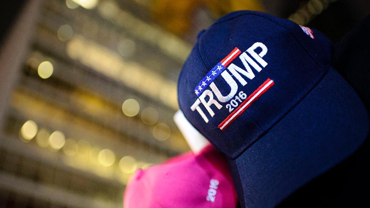 A Trump baseball cap is shown zoomed in