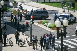 Man with firearm arrested on US Capitol grounds: police Man with firearm arrested on US Capitol grounds: police