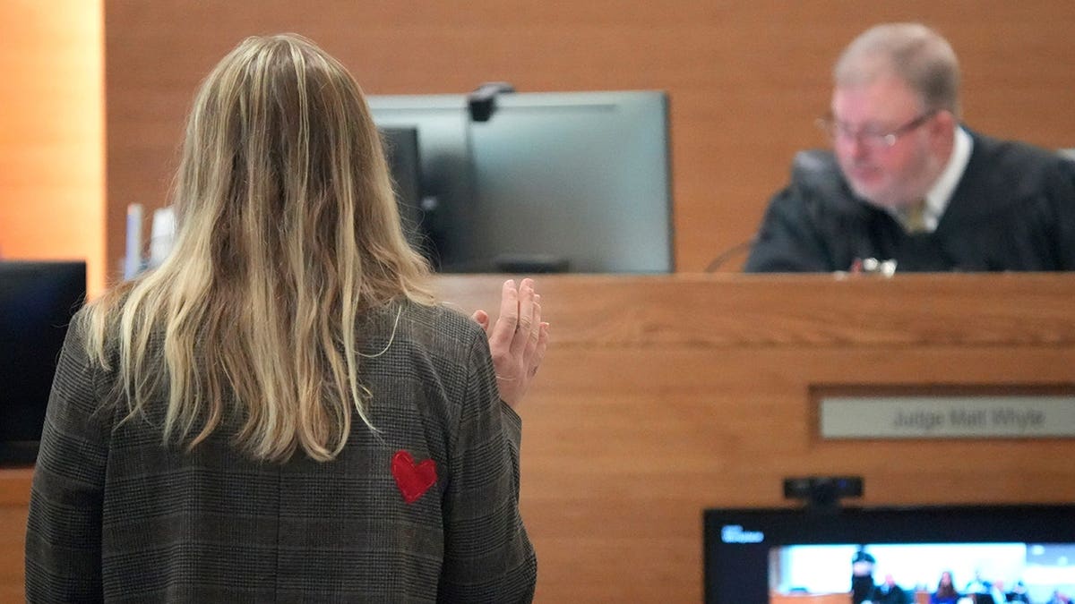 Eva Benefield, daughter of Doug Benefield, is sworn in before making her victim impact statement during sentencing.
