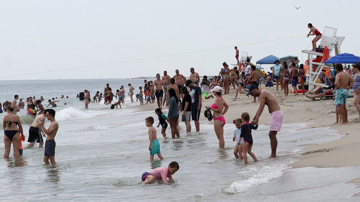 jersey shore people swimming beach