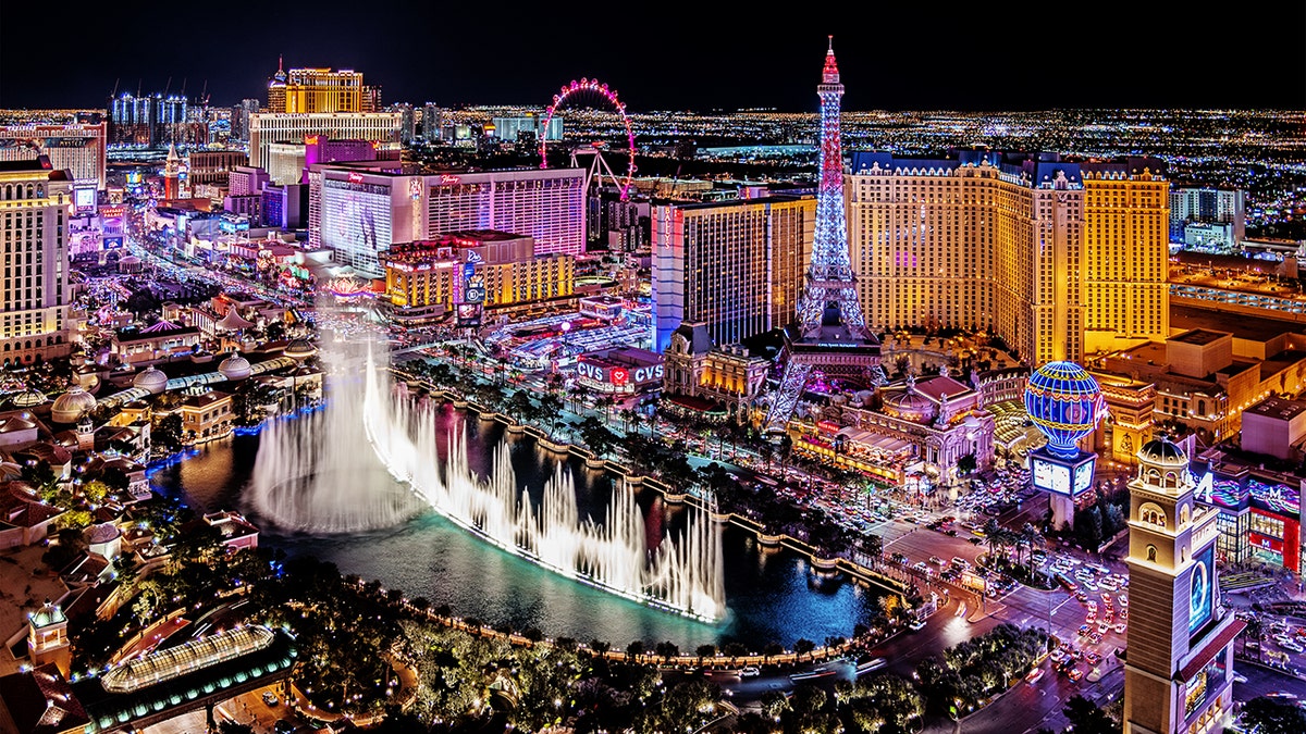 Vegas Strip illuminated at night, wide shot