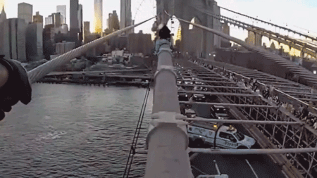 Dramatic bodycam video captures NYPD officer rescuing woman from top of Brooklyn Bridge after emotional plea