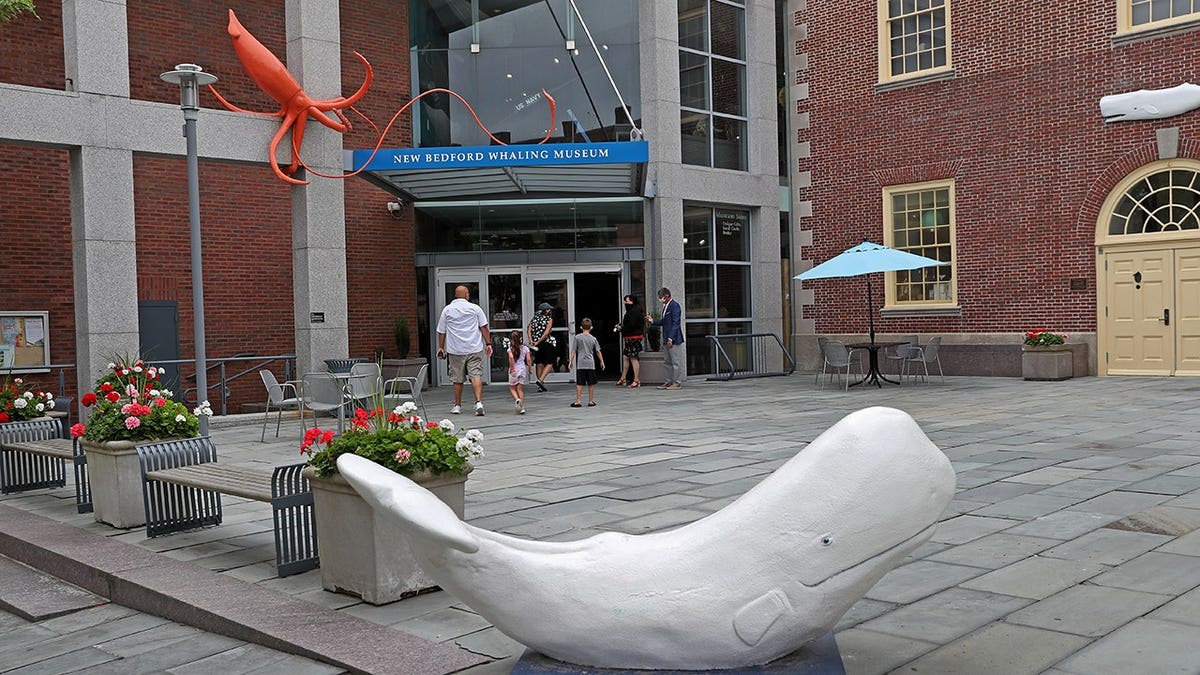 Museum patrons arrive at the New Bedford Whaling Museum.