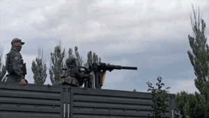 WATCH: Russian soldier thrown through air as Soviet-era helicopter gun spins out of control WATCH: Russian soldier thrown through air as Soviet-era helicopter gun spins out of control