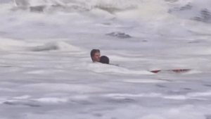 Heroic 16-year-old lifeguard rescues child from monster surf in heart-stopping video