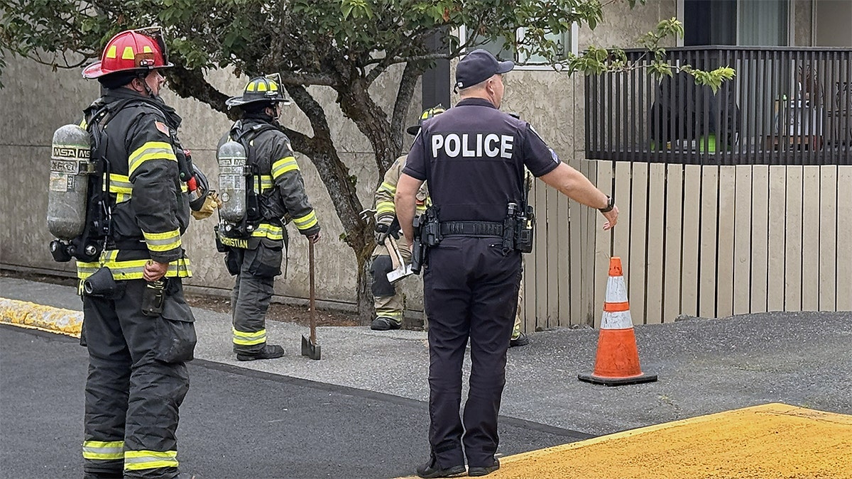 Animated video shows firefighters opening an electrical room door before an explosion sends flames and debris outward at a Tacoma apartment complex.
