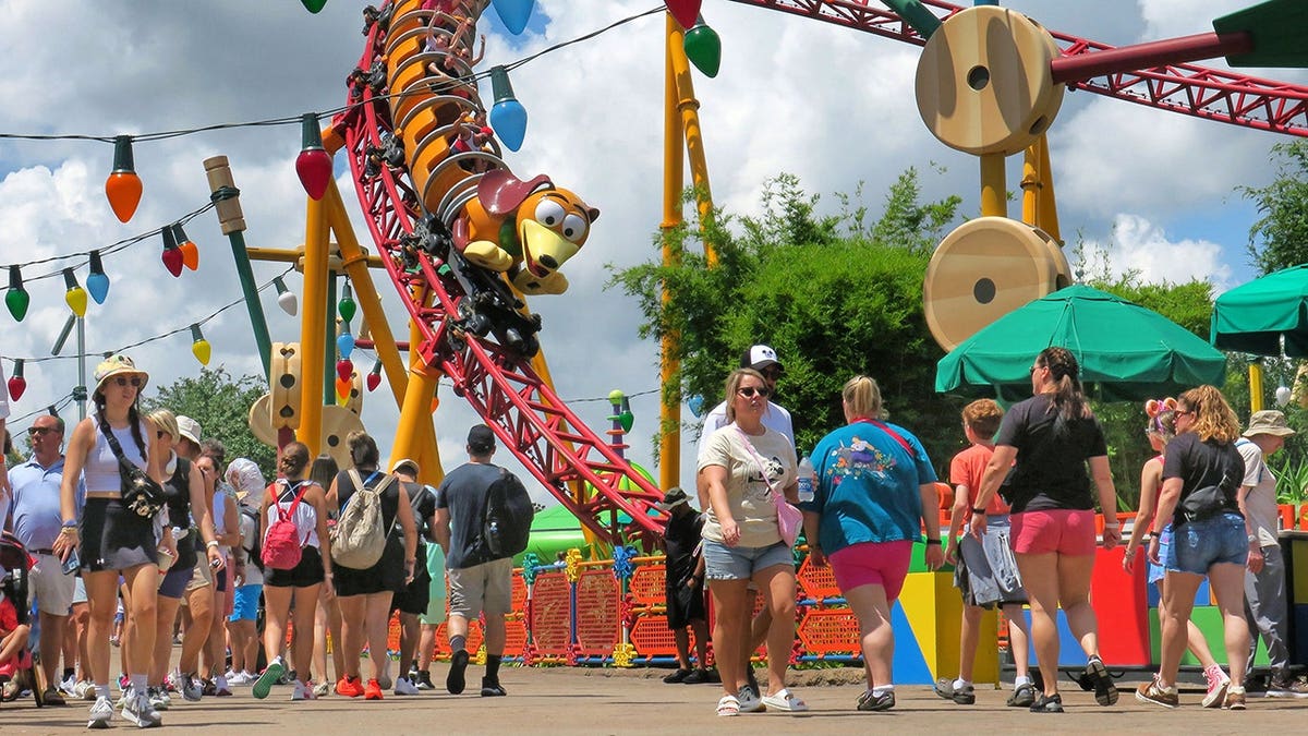 People lining up for the Toy Story Land ride.