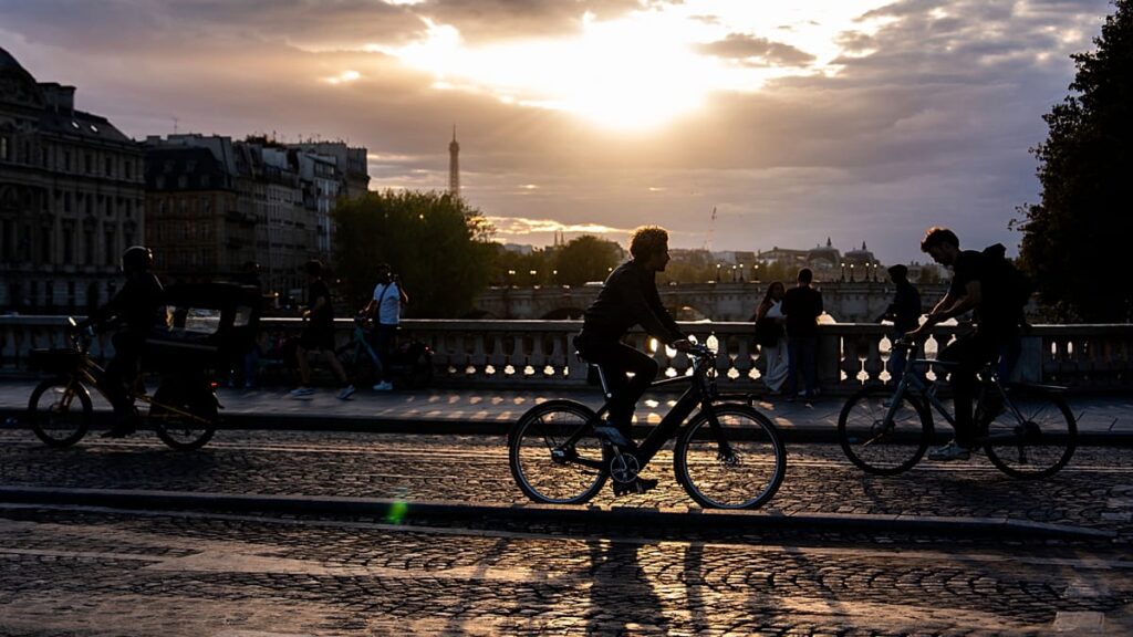 In Paris, tourists increasingly choose bikes to explore the city