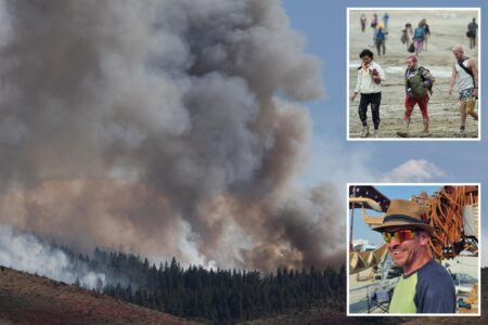 Burning Man issues warning to thousands of revelers as Nevada wildfire burns along key route to festival
